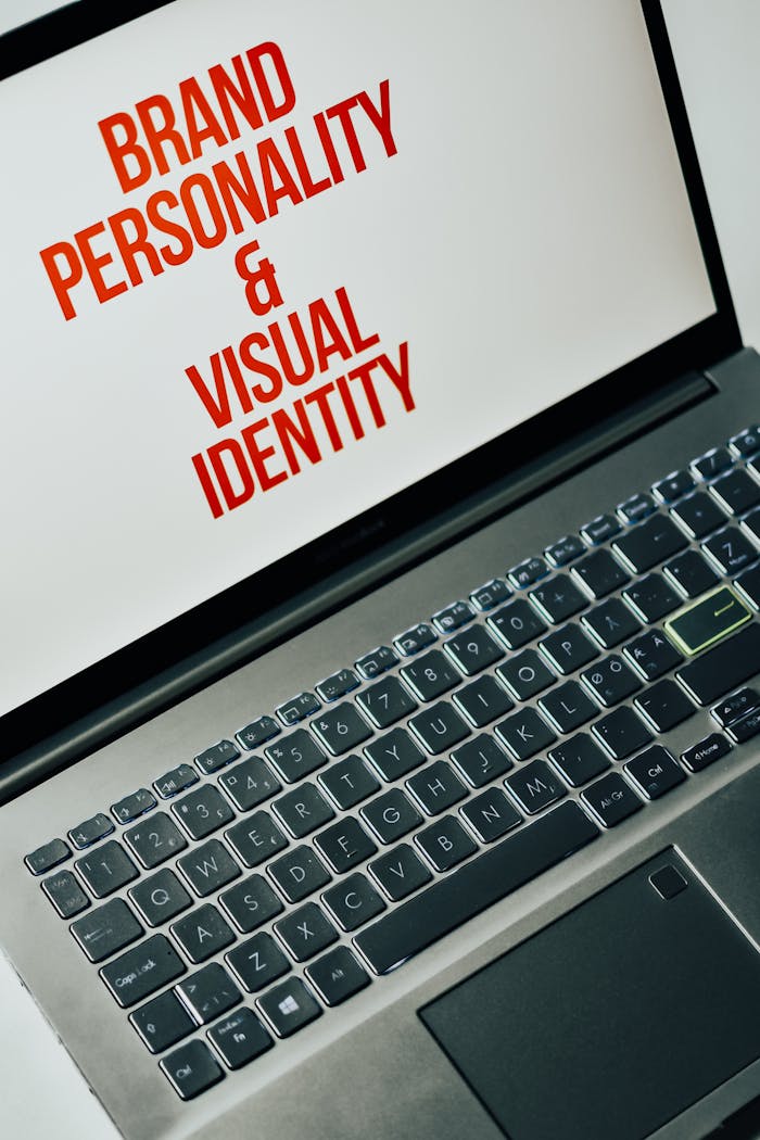 why-choose-us Laptop screen showing text on brand personality and visual identity for marketing strategy.
